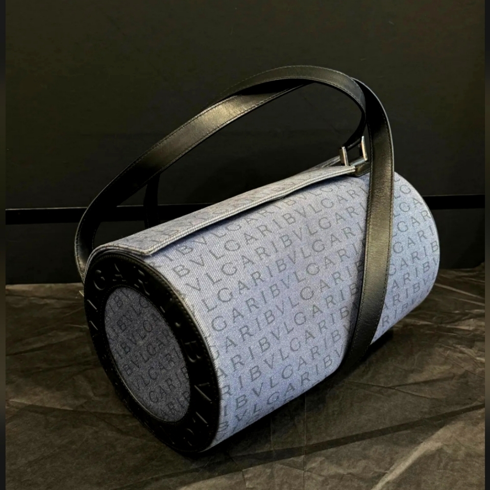 Bvlgari Macadam Denim and Leather Logomania Drum Bag.